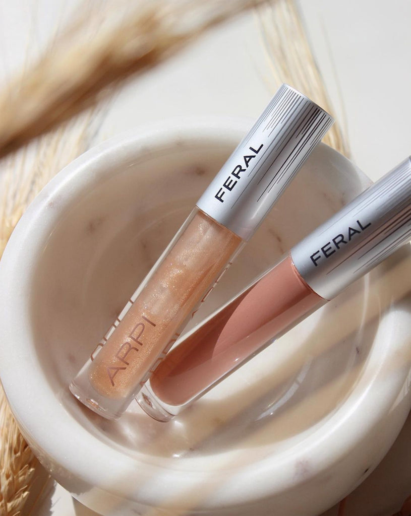 Nude Liquid Matte Lipsticks in a marble cup